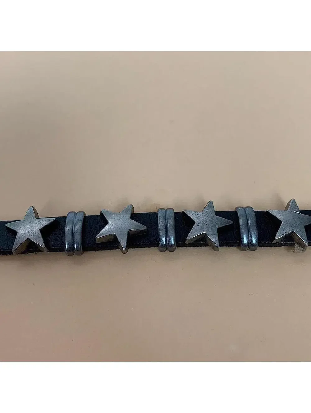 Y2k style silver star black leather bracelet. Adjustable. Cool design. Nice